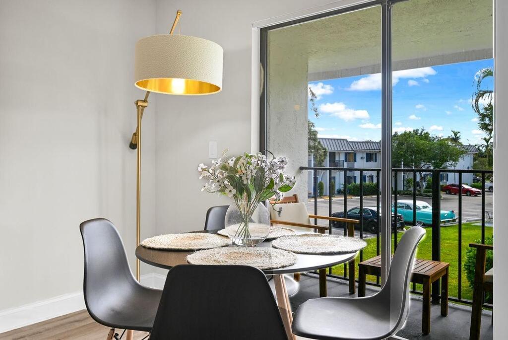 Relaxing Poolside Spot Access Parking Apartment Boca Raton